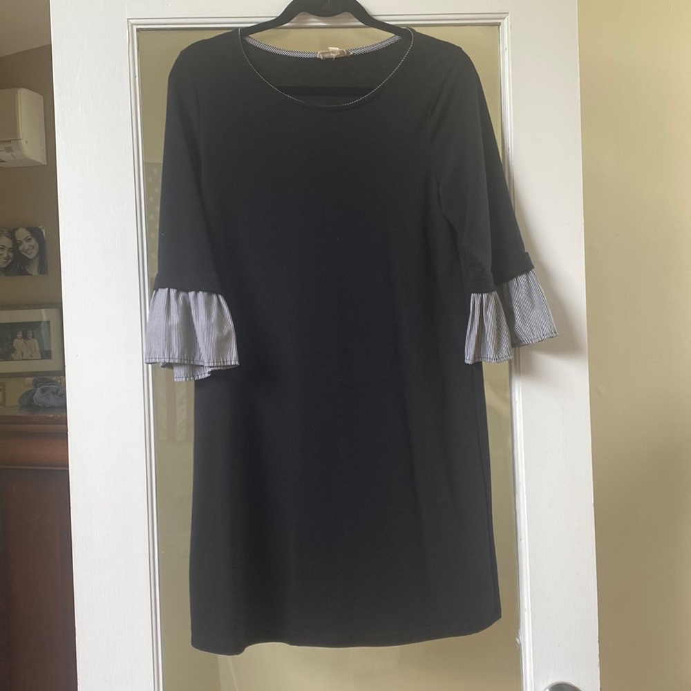 Black dress, three quarter bell sleeve. Easy fit